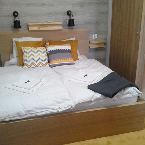 Apartament 2-osobowy na parterze z tarasem z 1 pomieszczeniem sypialnianym (możliwa dostawka)