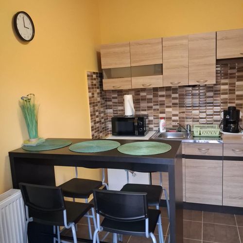 Apartament 4-osobowy z tarasem z 1 pomieszczeniem sypialnianym