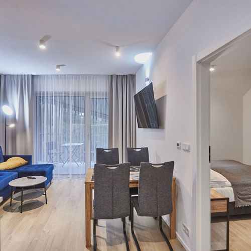 Apartament 4-osobowy na piętrze z balkonem z 2 pomieszczeniami sypialnianymi