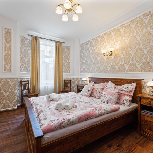 Deluxe Pokoj se sprchou s manželskou postelí