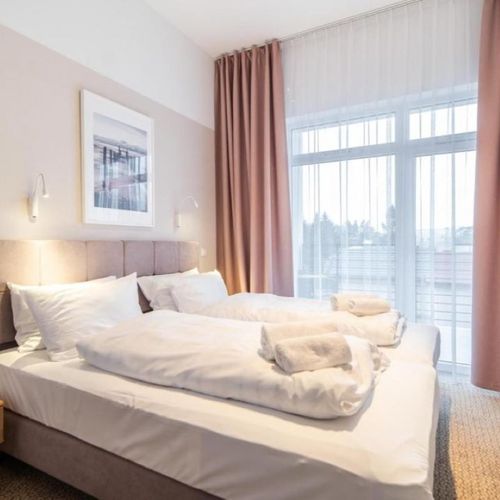 Apartament 4-osobowy z 2 pomieszczeniami sypialnianymi