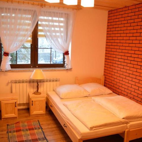 Apartament 8-osobowy z widokiem na ogród z 3 pomieszczeniami sypialnianymi (możliwa dostawka)