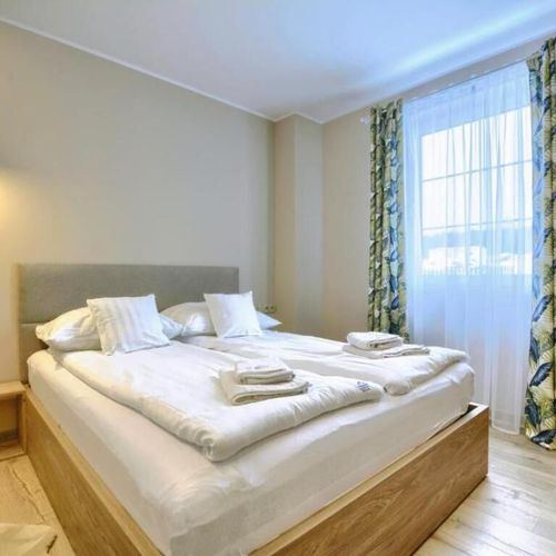 Apartament 4-osobowy z balkonem z widokiem na góry z 2 pomieszczeniami sypialnianymi (możliwa dostawka)