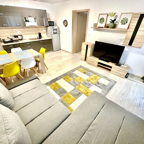 Apartament la parter cu terasă cu 3 camere pentru 6 pers.