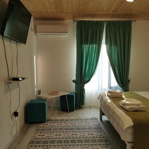 Apartament studio la mansardă cu 2 camere pentru 4 pers.