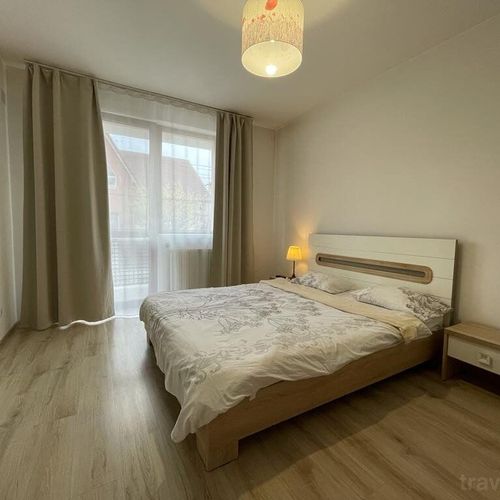 Apartament 4-osobowy z balkonem z 2 pomieszczeniami sypialnianymi