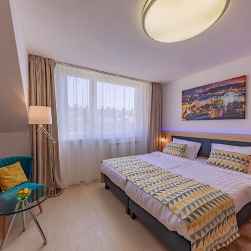 Camera twin deluxe cu vedere spre grădină