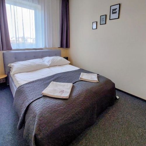 Apartament 4-osobowy Przyjazny podróżom rodzinnym z widokiem na ogród z 2 pomieszczeniami sypialnianymi