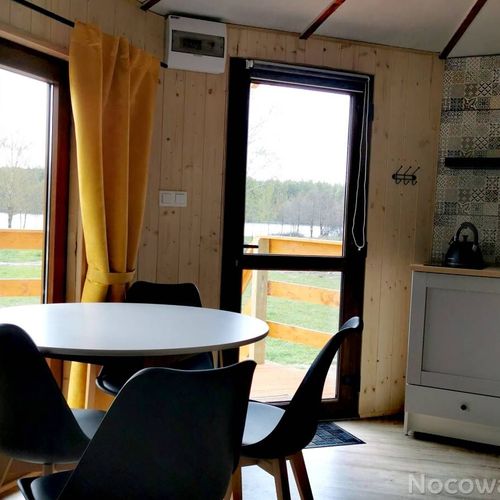 Domek drewniany 4-osobowy z dostępem do ogrodu z widokiem na jezioro