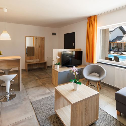 Apartament 4-osobowy z balkonem z dostępem do ogrodu z 1 pomieszczeniem sypialnianym