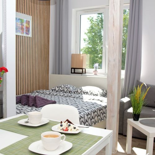 Apartament 4-osobowy z balkonem z wanną z 1 pomieszczeniem sypialnianym