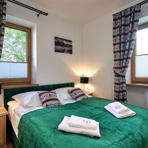 Apartament 4-osobowy z łazienką z widokiem na ogród z 2 pomieszczeniami sypialnianymi