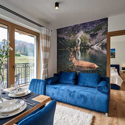 Apartament 3-osobowy z balkonem z widokiem na góry z 2 pomieszczeniami sypialnianymi