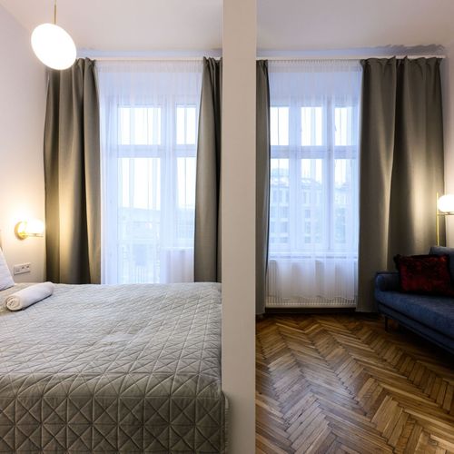 Apartament 4-osobowy z balkonem z aneksem kuchennym z 2 pomieszczeniami sypialnianymi