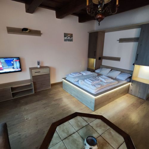 Apartament cu aer condiționat cu grădină pentru 4 pers. (se inchirieaza doar integral) (se poate solicita pat suplimentar)