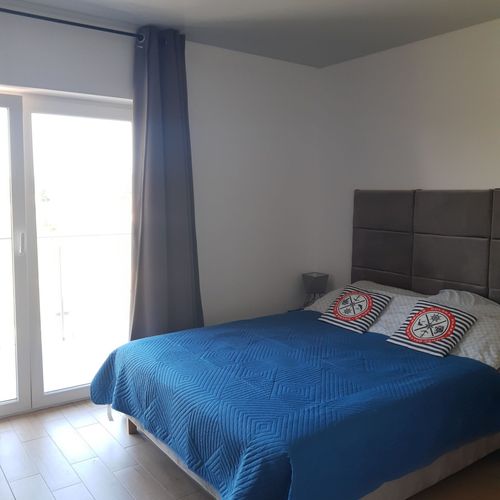 Pokój 3-osobowy z balkonem z widokiem na ogród