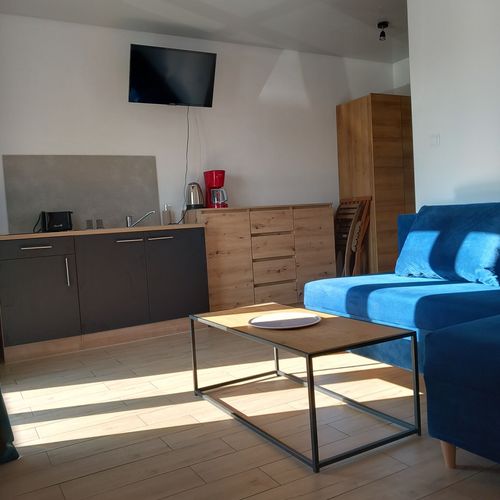 Apartament 4-osobowy z balkonem z 2 pomieszczeniami sypialnianymi