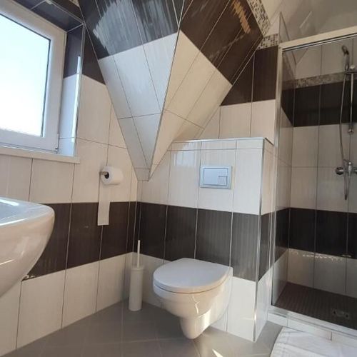 Apartament 8-osobowy z 4 pomieszczeniami sypialnianymi