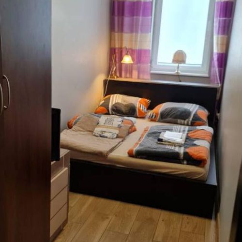 Apartament 4-osobowy z balkonem z łazienką z 2 pomieszczeniami sypialnianymi