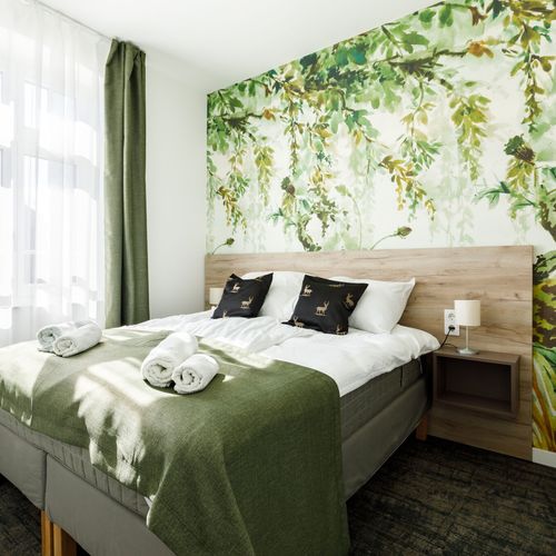 Apartament la parter cu terasă cu 2 camere pentru 4 pers.