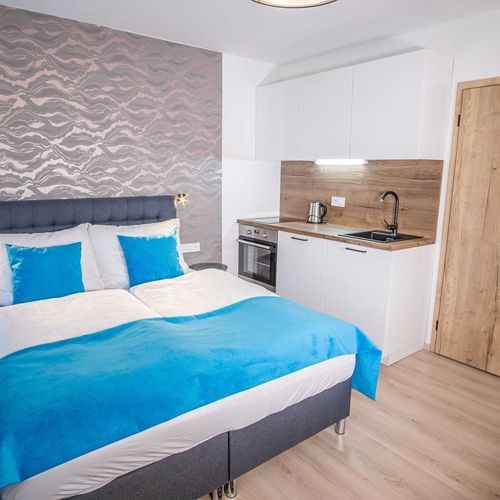 Apartman se sprchou s vlastní kuchyňkou s manželskou postelí s 1 ložnicí