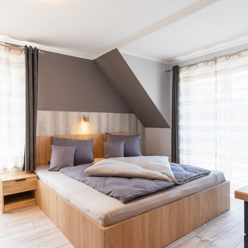 Apartament la mansardă cu vedere spre curte cu 1 camera pentru 2 pers.
