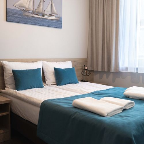 Apartament 4-osobowy na parterze z tarasem z 2 pomieszczeniami sypialnianymi