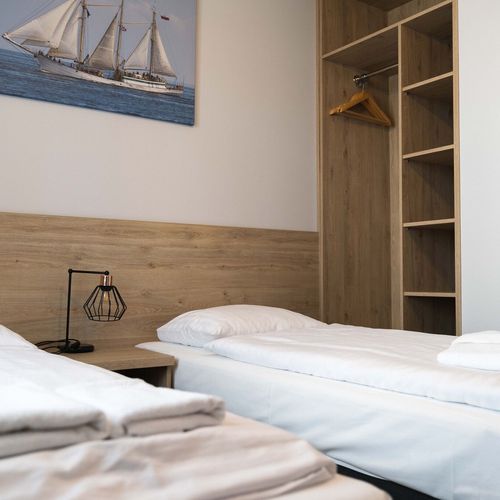 Apartament 4-osobowy na parterze z tarasem z 2 pomieszczeniami sypialnianymi