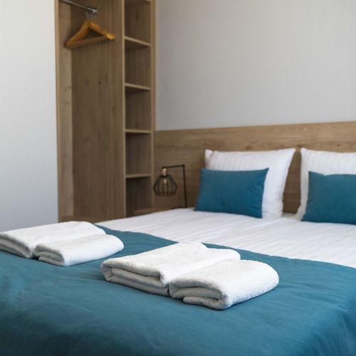 Apartament 4-osobowy na piętrze z balkonem z 2 pomieszczeniami sypialnianymi