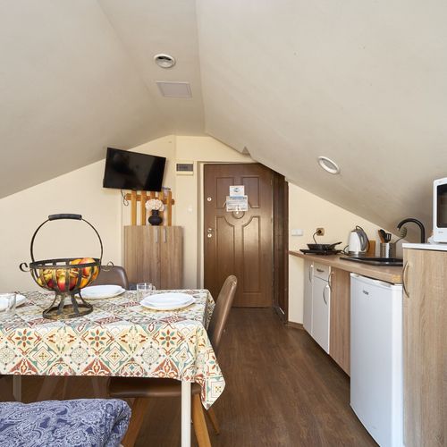 Apartament 4-osobowy z łazienką z własną kuchnią z 1 pomieszczeniem sypialnianym