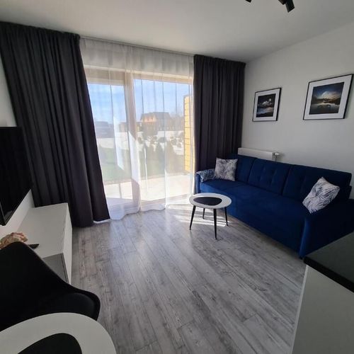 Apartament 4-osobowy na parterze z klimatyzacją z 2 pomieszczeniami sypialnianymi