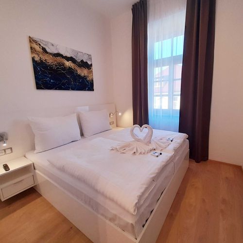 Apartman s koupelnou s manželskou postelí s 1 ložnicí (s možností přistýlky)