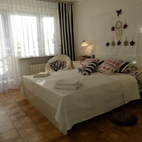 Apartament 4-osobowy z 2 pomieszczeniami sypialnianymi