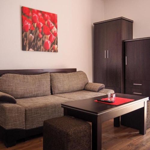 Pokój 4-osobowy z balkonem z widokiem na ogród