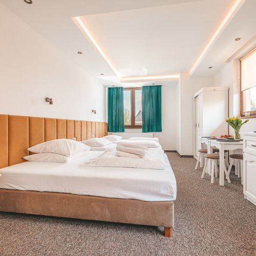Apartman s vlastní kuchyňkou pro 4 os. s 1 ložnicí na poschodí