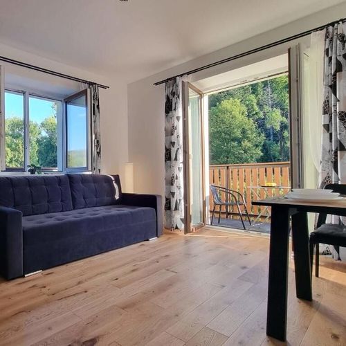 Apartament 4-osobowy z balkonem z widokiem na góry z 1 pomieszczeniem sypialnianym