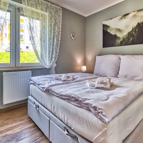 Apartament 4-osobowy z 2 pomieszczeniami sypialnianymi