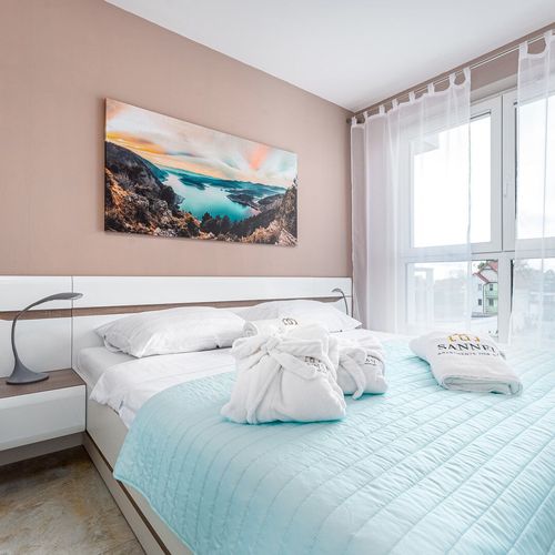 Apartament 4-osobowy z balkonem z łazienką z 2 pomieszczeniami sypialnianymi