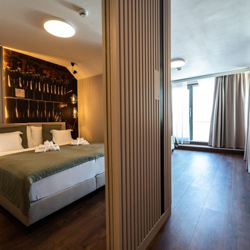 Suita penthouse design cu 1 camera pentru 2 pers.