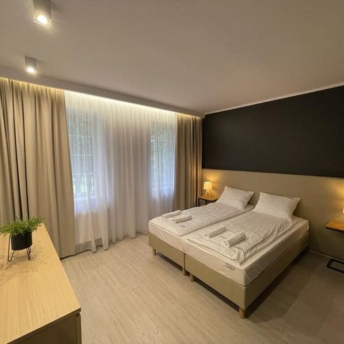 Deluxe Apartman pro 4 os. se 2 ložnicemi na přízemí
