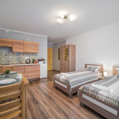 Apartman pro 2 os. s 1 ložnicí s výhledem na hory na poschodí