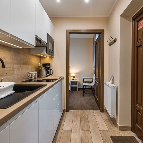 Apartament 4-osobowy na parterze z widokiem na ogród z 2 pomieszczeniami sypialnianymi