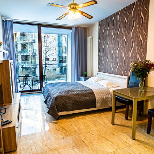 Apartament 2-osobowy na piętrze z aneksem kuchennym z 1 pomieszczeniem sypialnianym