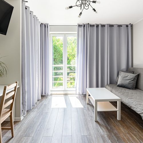 Apartament 6-osobowy z dostępem do ogrodu z własną kuchnią z 2 pomieszczeniami sypialnianymi