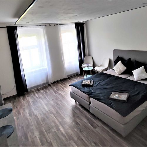 Apartament 2-osobowy na parterze z aneksem kuchennym z 1 pomieszczeniem sypialnianym (możliwa dostawka)