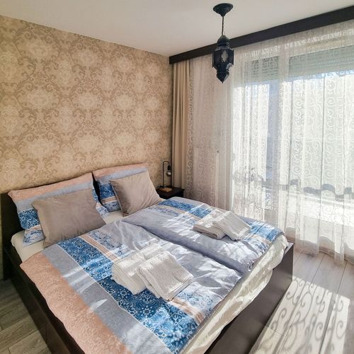 Apartament cu balcon cu aer condiționat cu 1 camera pentru 2 pers. (se poate solicita pat suplimentar)