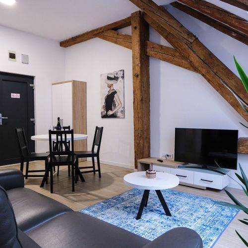 Apartament 2-osobowy Komfort z aneksem kuchennym z 1 pomieszczeniem sypialnianym