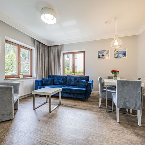 Apartament 6-osobowy na parterze z widokiem na ogród z 3 pomieszczeniami sypialnianymi