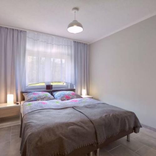 Apartament 4-osobowy z widokiem na ogród z 2 pomieszczeniami sypialnianymi