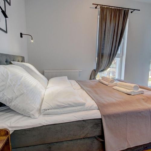 Apartament 4-osobowy z 2 pomieszczeniami sypialnianymi